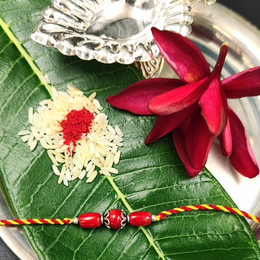 Silver Jewelry Rakhi by Jauhri 92.5 Silver Rakshabandhan Special - Red Bloom Rakhi