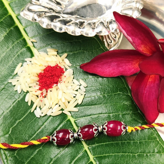 Silver Jewelry Rakhi by Jauhri 92.5 Silver Rakshabandhan Special - Pink Bloom Rakhi