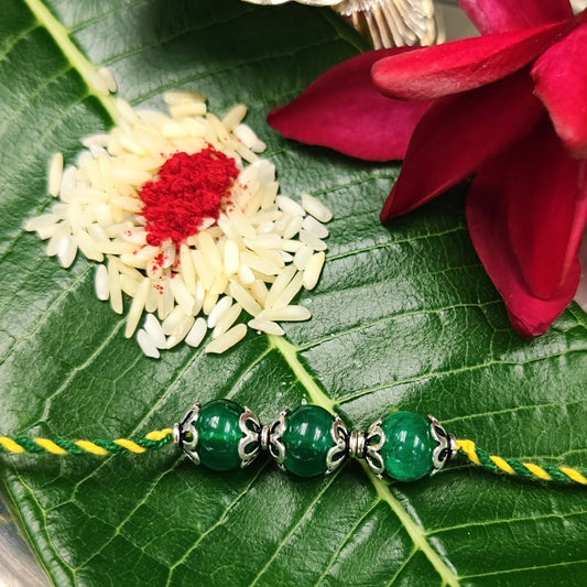 Silver Jewelry Rakhi by Jauhri 92.5 Silver Rakshabandhan Special - Green Bloom Rakhi
