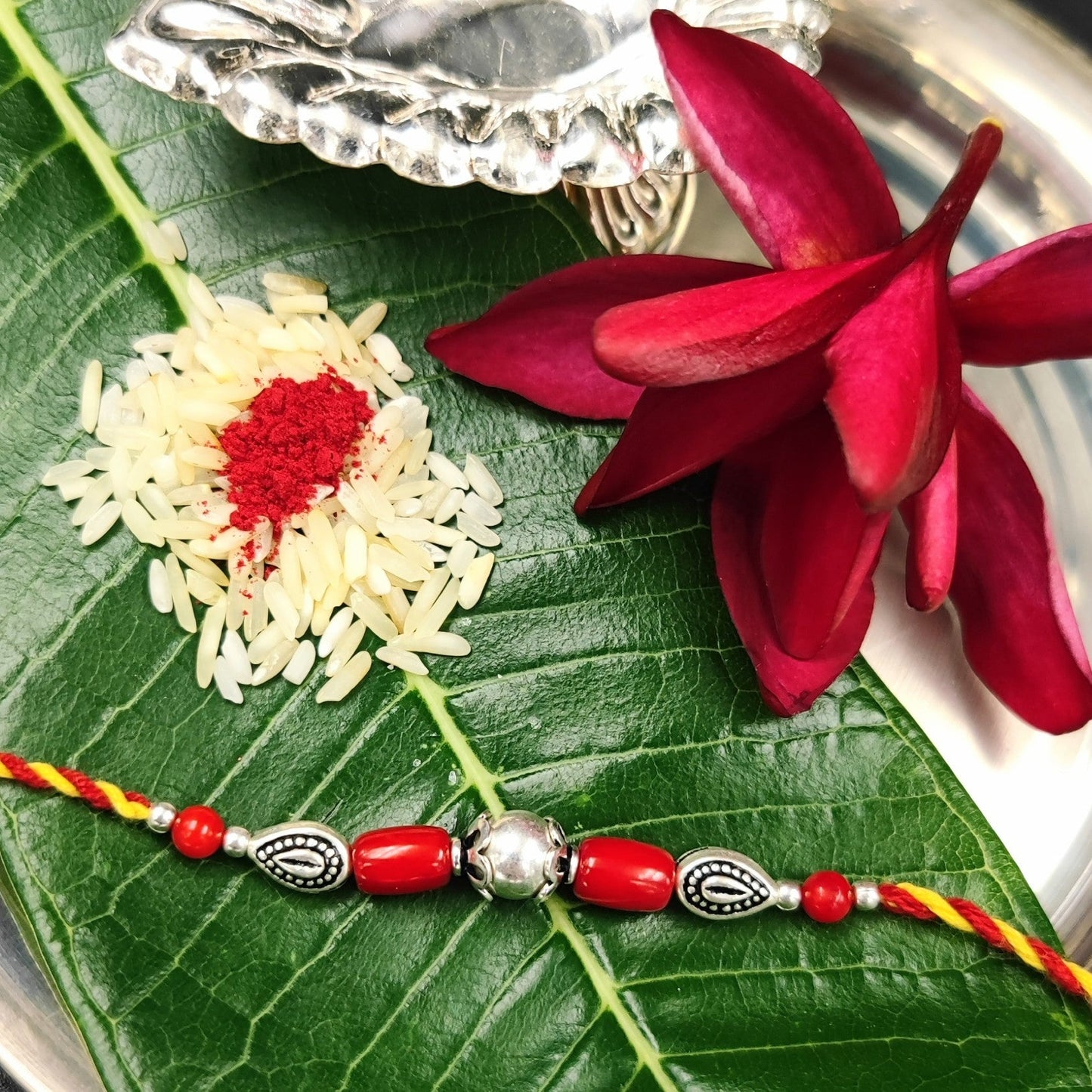Silver Jewelry Rakhi by Jauhri 92.5 Silver Rakshabandhan Special - Coral Leaf Rakhi