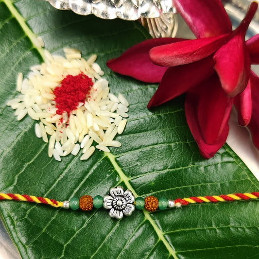 Silver Jewelry Rakhi by Jauhri 92.5 Silver Rakshabandhan Special - Rudraksh Flower Rakhi