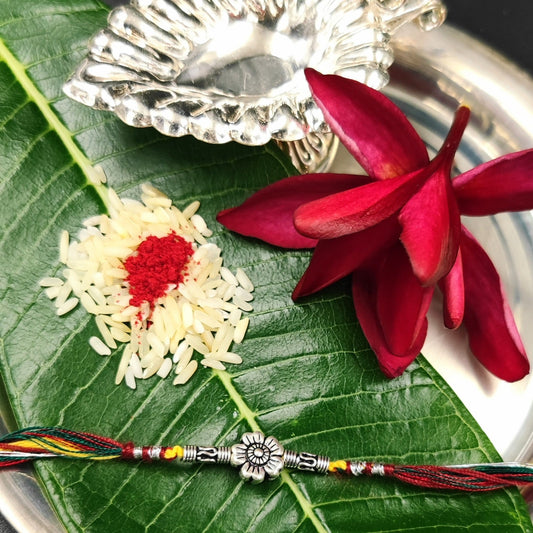 Silver Jewelry Rakhi by Jauhri 92.5 Silver Rakshabandhan Special - Flower Stem Rakhi